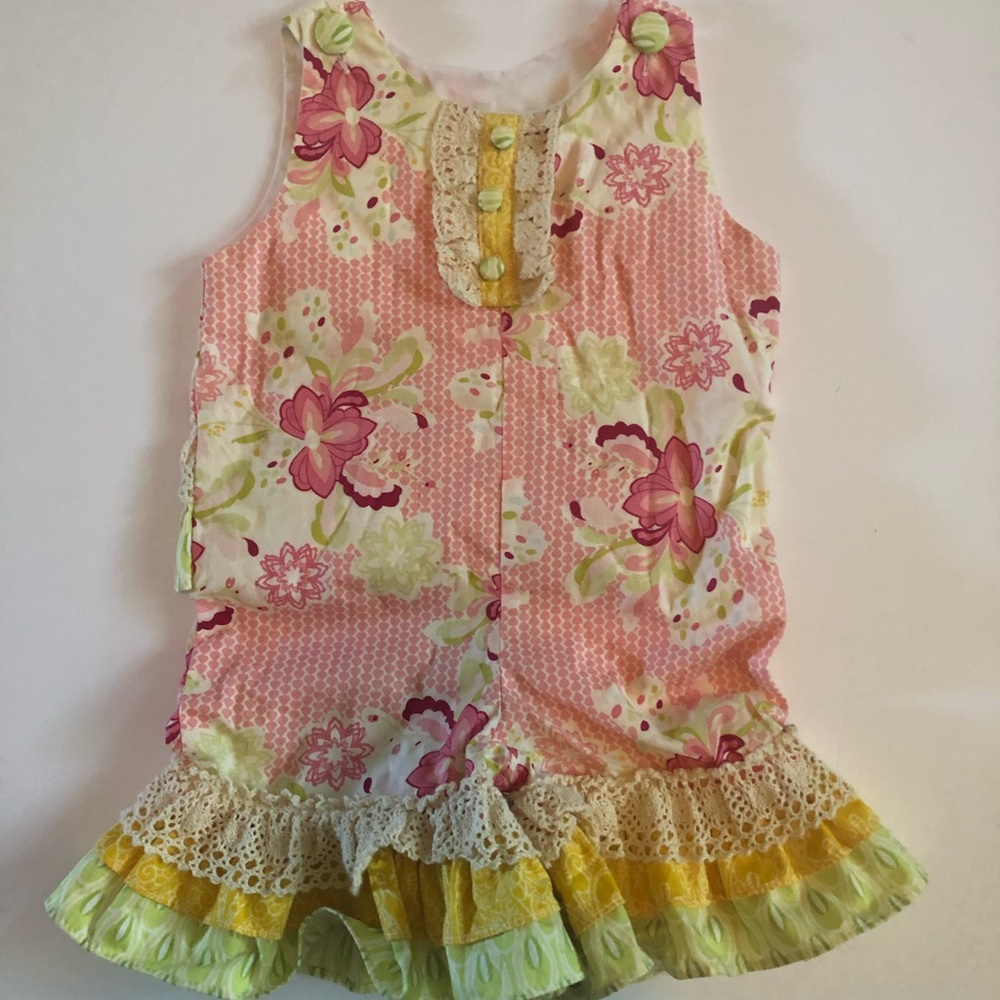 Boutique-style girls romper, 6-9 months.